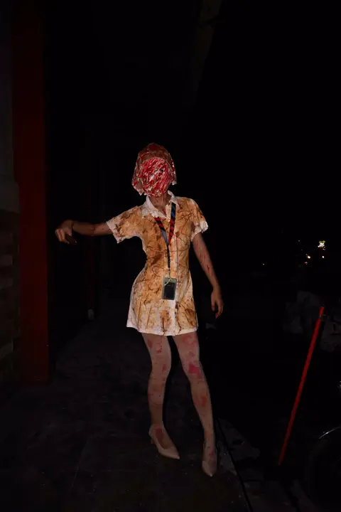 Zombie nurse in the dark